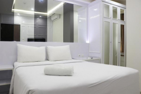 Comfort 2BR Apartment at 30th Floor Transpark Cibubur By Travelio